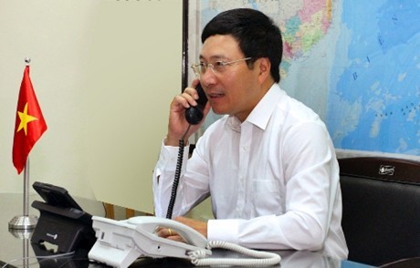 Entretiens téléphoniques de Pham Binh Minh avec Yang Jiechi et John Kerry - ảnh 1